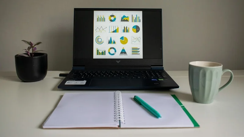 Close view of mortgage rate comparison on a laptop screen at a home office desk