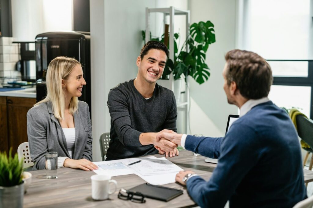 Couple meeting with a Calgary mortgage broker to discuss home financing options