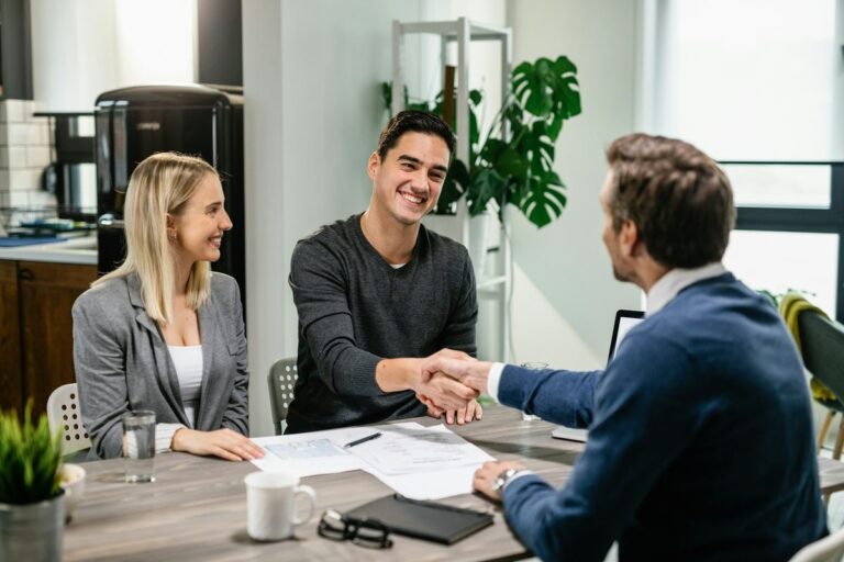 Couple meeting with a Calgary mortgage broker to discuss home financing options